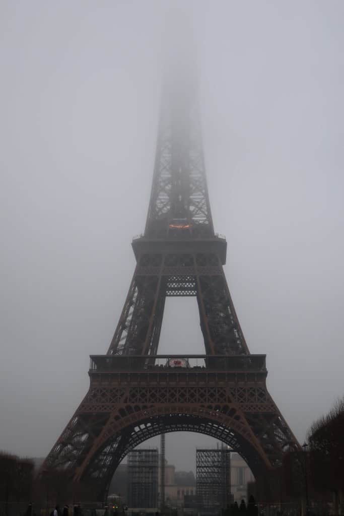 One of the best reasons to visit Paris in January is to see the Eiffel Tower shrouded in fog
