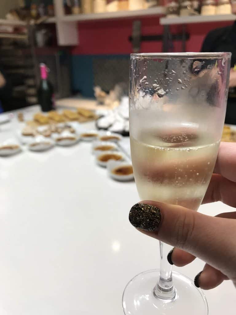Enjoying Champagne with our baked goods at Cook'n With Class Paris